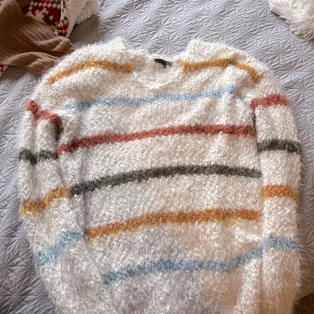 Multicolored striped sweater.